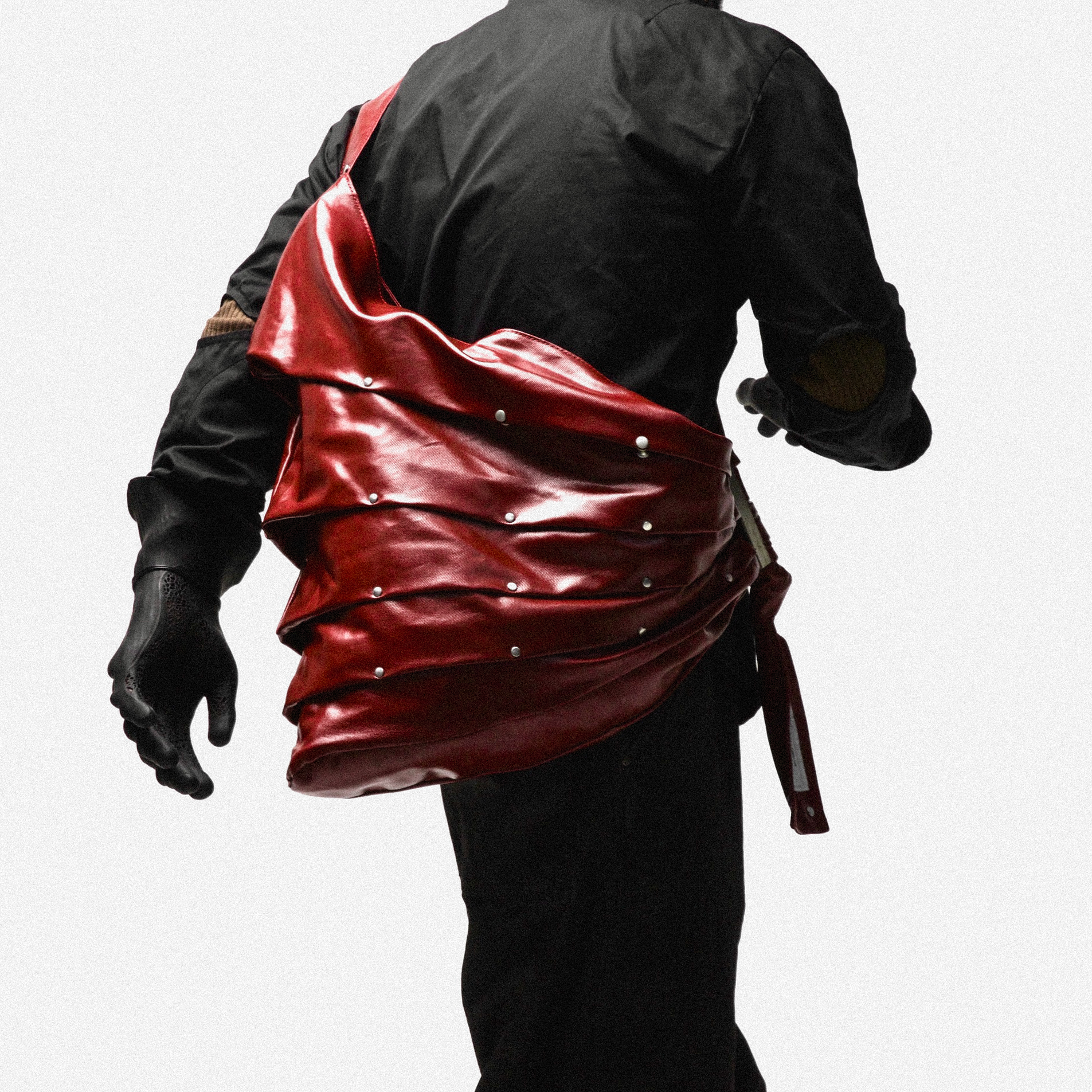 MULTI RIVET TRAMPBAG